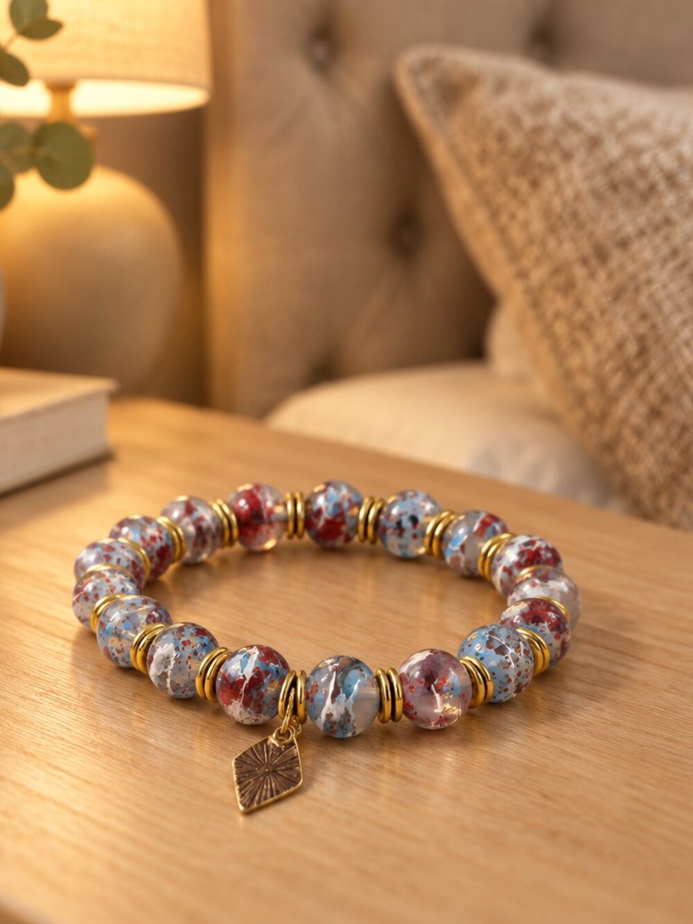 Multi-Colored Glass Beaded Bracelet with Gold Spacers and Gold Charm - NWOT